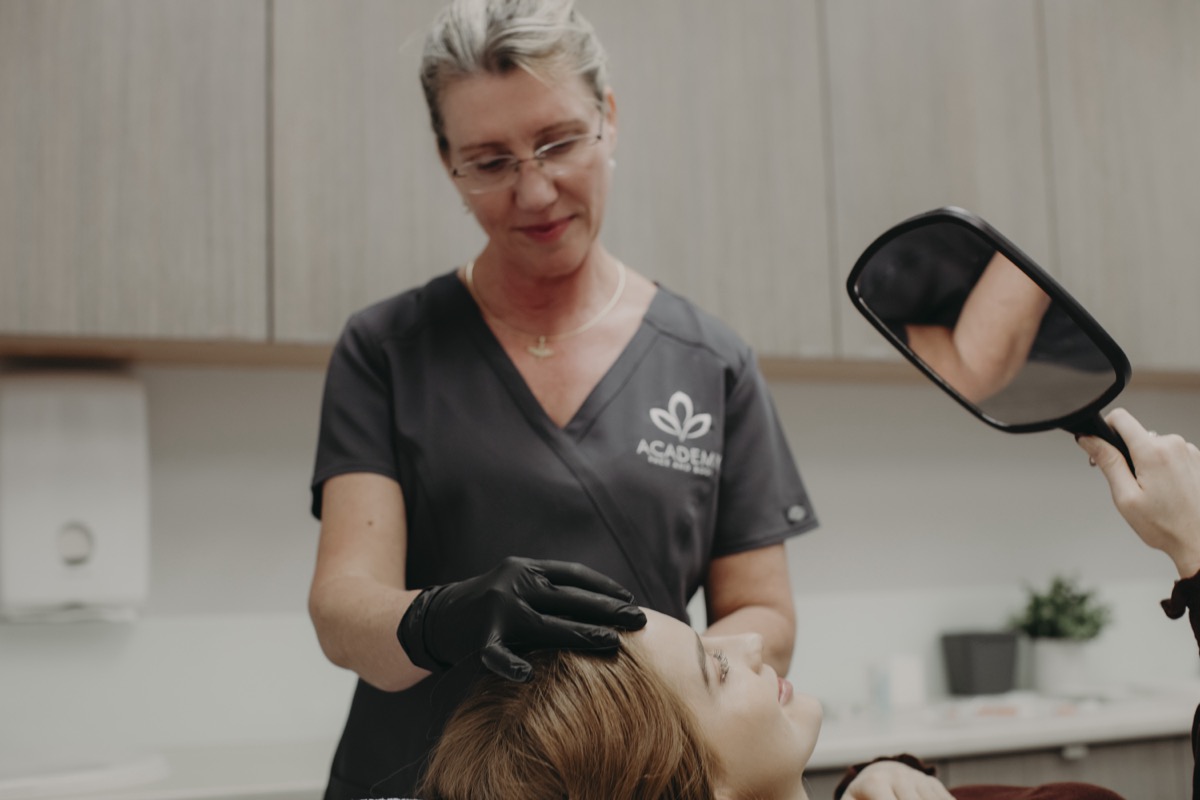 Cheek filler treatment with visible results.